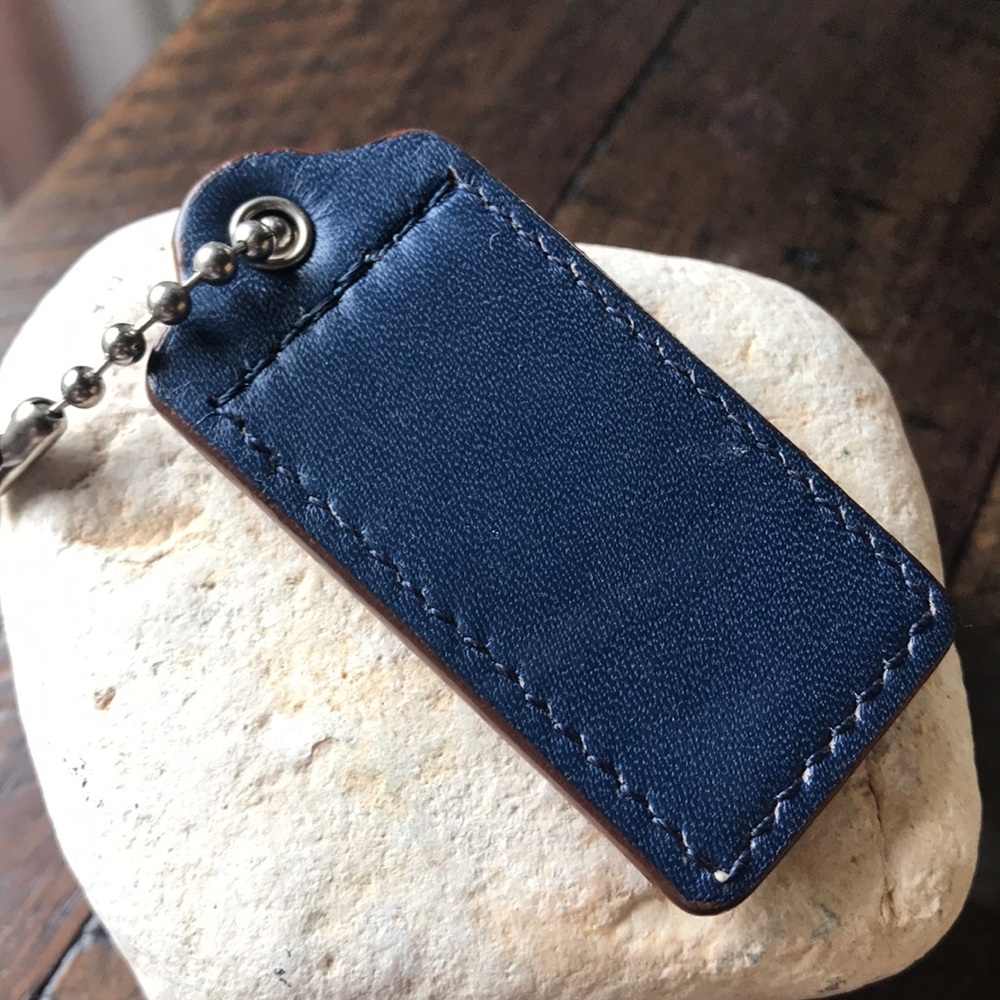 Brown and blue coach charm